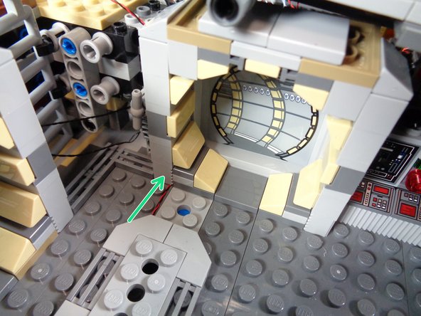 Mount the light as low as possible inside the opening, to allow for the top 2x4 plate to fit back on top of the opening.