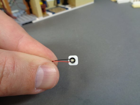 Remove the orange Pico LED light from the &quot;Middle Level Interior Lights and Parts&quot; bag.  This LED light will have a 6&quot;/15.2cm wire and should be the last light left in the bag.