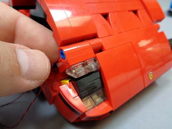 Pull in any loose LED wires so no wires are visible outside of the car body.