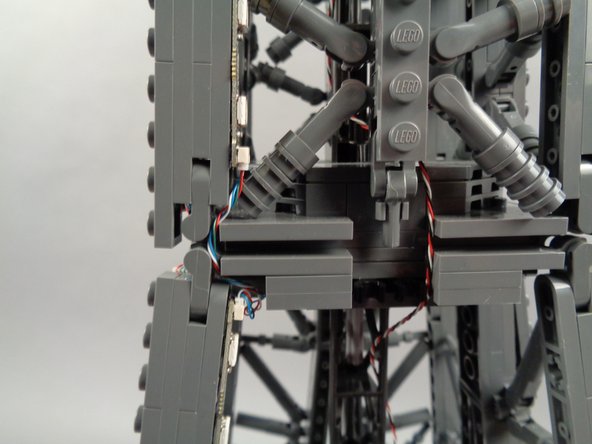 As shown in the photos for this step, you can use the tweezers to tidy up any visible sections of wire connecting the 17-LED sections and 20-LED sections of both light strips.