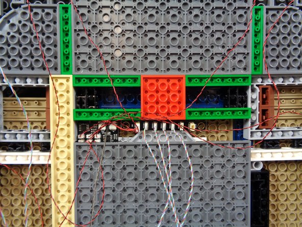 As shown in the third photo, you should now have the BRANCH17 and BRANCH09XS adapter boards mounted under the castle so their plugs do not stick out below the bottom plates of the castle base.