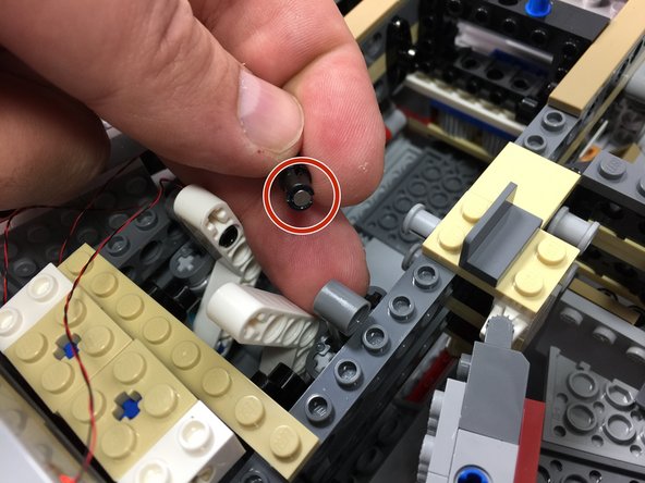 Your kit includes a magnetic switch that controls a light inside the boarding ramp.  The light turns on when the boarding ramp is open and it turns off when the ramp is closed.