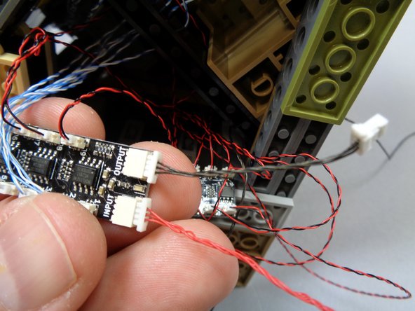 Make sure you are connecting the 3-wire cable you fed down into the base in Step 27, NOT the cable you left hanging outside the castle in Step 32.