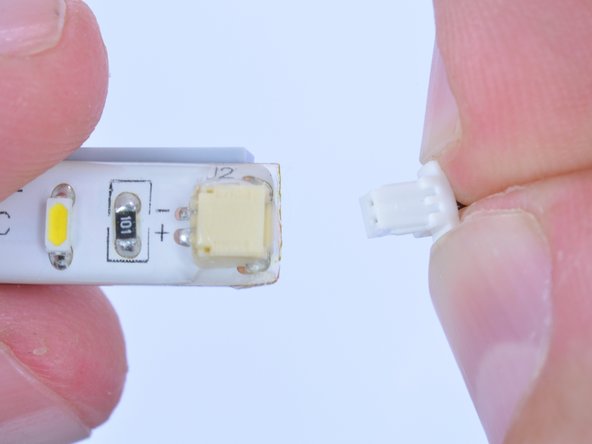 To remove a plug, pinch its tabs gently with your finger and pull straight out, pulling from the tabs and not the wire.