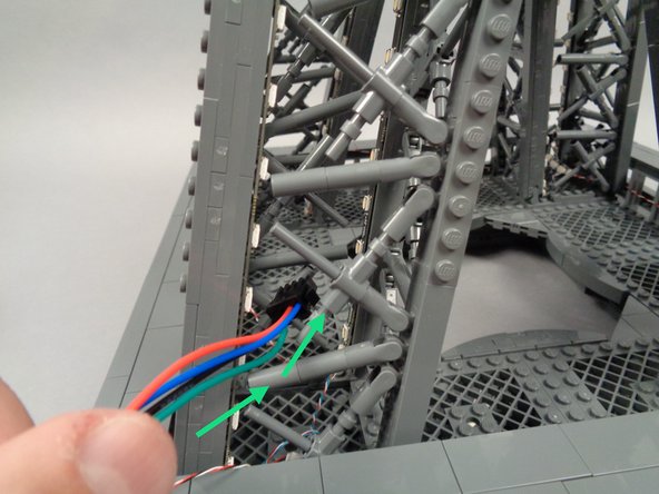 In order to complete the control loop for the middle section of your tower, you will need to place the inter-level connecting board inside the first pillar, so the control cable coming from the 4th pillar can reach.