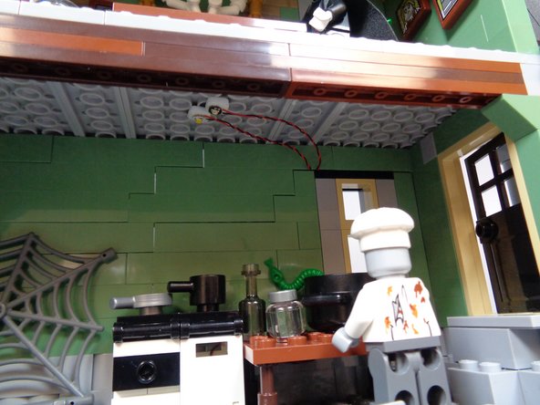 You should have three wires extending through the back of the kitchen wall: