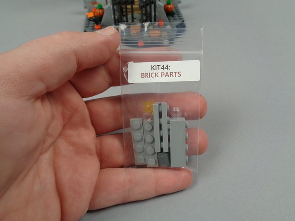 As shown in the third photo for this step, you'll also need the &quot;Brick Parts&quot; bag (which was contained in the larger Bag 1 of your light kit).