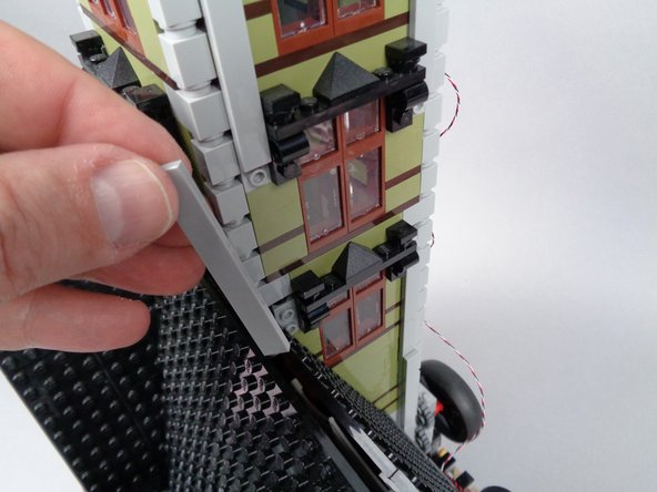 Next you will remove the top tower section.