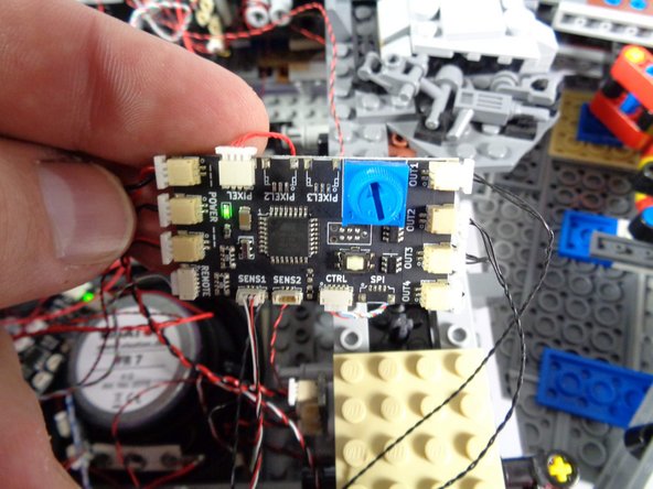 One connects directly to one of the POWER plugs on the new TRUNK08 controller.