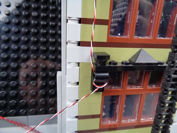 Always make sure to keep the wire away from the elevator chain, so it won't get pulled or caught when the elevator moves.