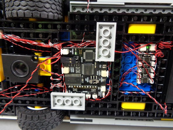 The main controller will cover the sound module, but the mounts for the controller are removable, so you can access the sound module again later if you decide to change sounds.