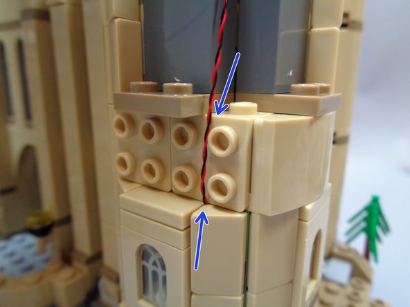 Make sure the light wire runs next to, not on top of, the studs as you re-attach the side piece.