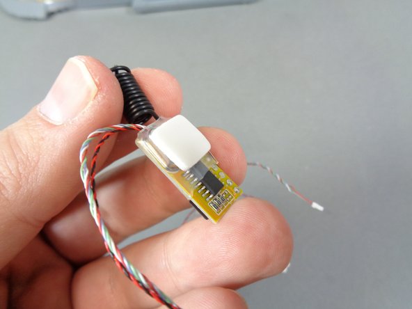 Inside the box labeled &quot;Remote Control and Power,&quot; remove the bag with the 4-button remote control and receiver circuit board.