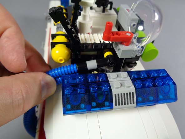 Once you've verified that all of the roof lights and the roof motor are working, you can re-attach the various hoses and the ladder you removed at the start of the installation process.