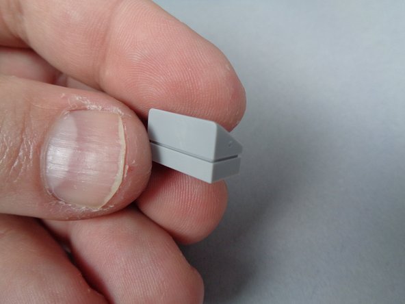 Assemble these two pieces as shown in the second photo for this step.