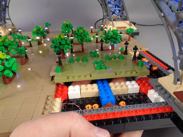 As shown in the photos for this step, remove the large center Panel 4.