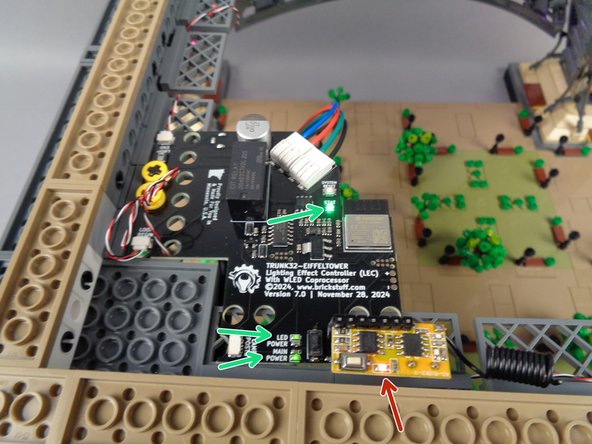 When power is turned on, three green LED lights should come on as shown by the three green arrows in the third photo.