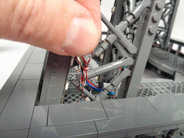 If there are any loose wires, you can tidy them up as shown in the photos by twisting, then tucking inside the nearest pillar.