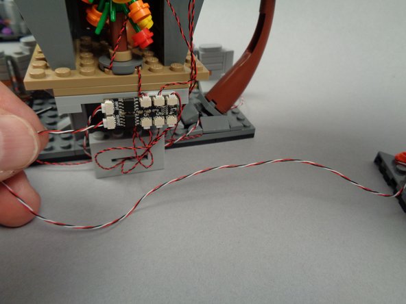 Prepare for the final light test by re-connecting all three sections, making sure the BRANCH06X driver board in each section is connected to the others correctly (INPUT and OUTPUT plugs connected correctly).