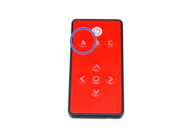 The &quot;A&quot; button on your remote (blue circle) controls the headlights.  Pressing it once will start the &quot;on&quot; sequence, and each of the eight LEDs in the headlight assembly will turn on in a pattern modeled after the &quot;real&quot; Bugatti.  Pressing the button again will turn the headlights off via a similar lighting sequence.