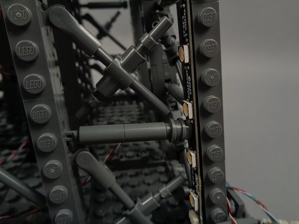 Remember you can re-position elements as needed to make space for the lights.  In cases where brace elements have multiple round plates attached, you can remove one or more of these extra parts to make the brace elements shorter and to make more room for the light strip.