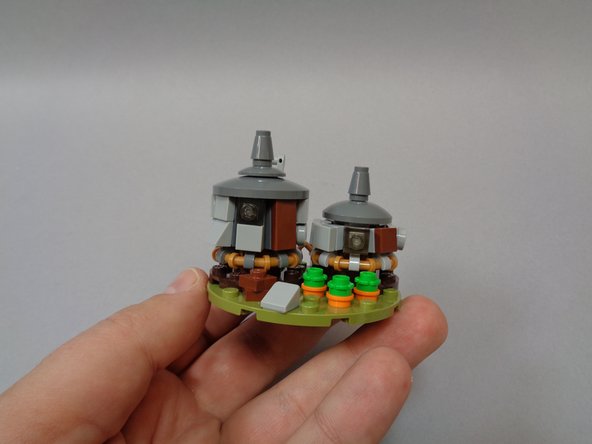 Remove the two roofs and two front windows from Hagrid's Hut as shown in the photos for this step.