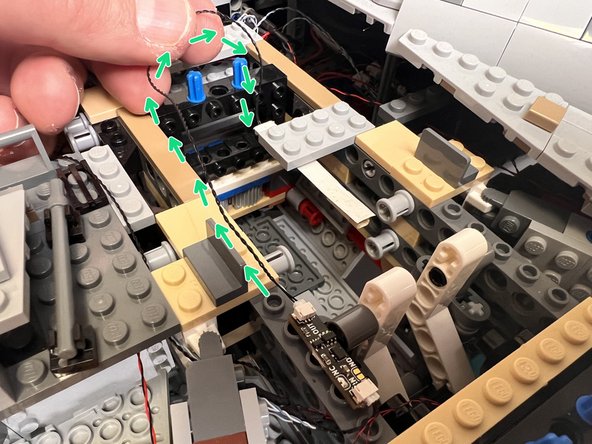 As shown in the second photo, connect the wire from the &quot;OUT&quot; plug on the magnetic switch circuit board to one of the plugs on the cool white light strip.