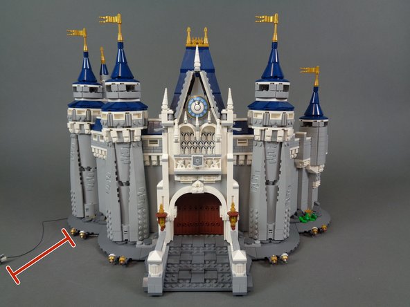 The second and third photos show the 2-wire cable connected to the BRANCH04 adapter board, and the red line in the third photo shows the approximate length of cable that should extend out from under the castle base to allow the main power supply to be connected.