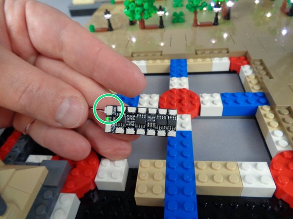 The photos for this step show only some of the bricks re-positioned-- your setup will have more bricks moved than are shown in these photos.