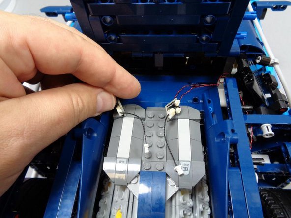 Take two 1.5&quot; black connecting cables from Bag 1, and connect them to the large plugs on both BRANCH03 adapter boards as shown in the first photo.