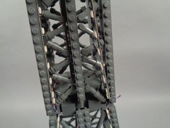 Next you will mount the top section (the 20-LED section) of strip #1.