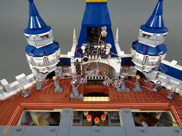 Using a pencil or tweezers, you can carefully coil up the extra wire so the appearance is cleaner, as shown in the second photo.