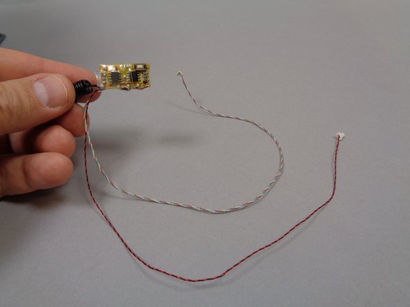 Now you will connect the remote control receiver to the TRUNK08 master controller.