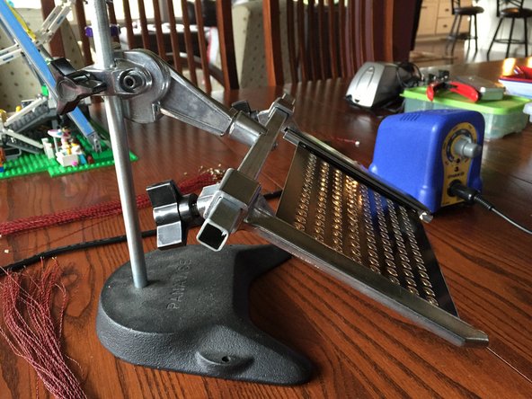 After securing the PC board panel, apply a liberal amount of solder to each copper pad.  Here it is best to over-apply solder, but make sure you don't cause a short circuit by bridging the pads.