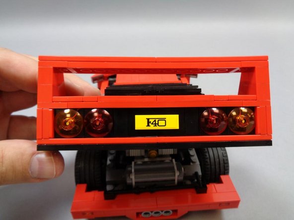 Re-attach the LEGO® parts you removed in Step 18, making sure that all LED wires run BETWEEN studs and not on top of them.