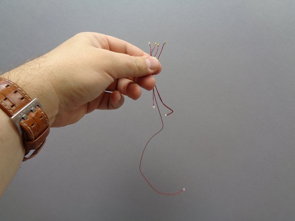 As shown in the third photo, attach a sticky square to the back of the warm white Pico LED light with the 3&quot; (7.6cm) wire.