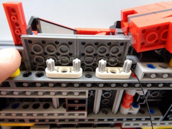 Make sure there is no slack in the black extension cable.  This is necessary to make sure the cable is long enough to reach all the way to be rear of the vehicle.