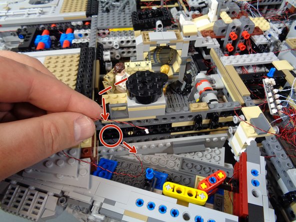 The photos in this step show the top door frame attached, but you will still have your door frame detached.