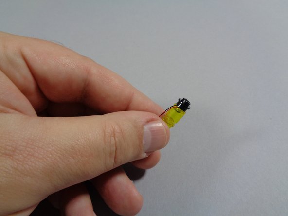 As shown in the third photo, re-attach the round black plate to the bottom of the lantern.