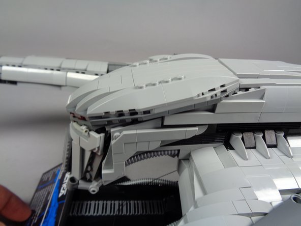 As shown in the second photo, place the effect controller and all connected wires inside the head-- there is open space to hold the controller and all wires.  Make sure any excess wire is coiled up so it does not stick out of the head section.