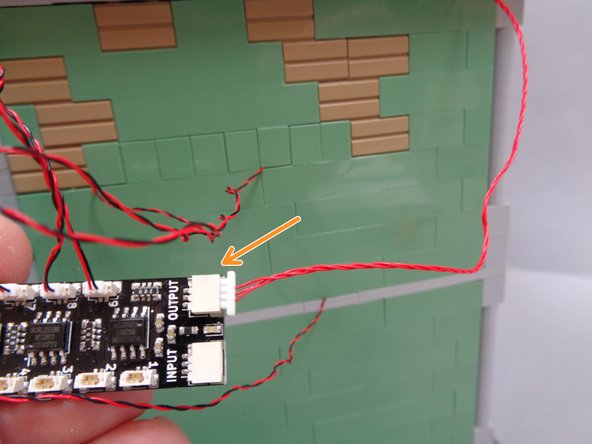 Take the red control wire and connect it to the large OUTPUT plug on the BRANCH09X adapter board as shown in the third photo.
