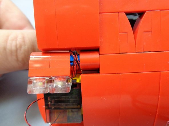 Be careful that the wires do not slide into the grooves of the Technic pin.  The wires need to remain outside the grooves and wrap around the outside of the pin only.