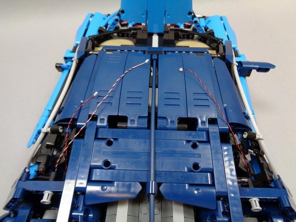 As shown in the third photo, you should have successfully routed three wires: