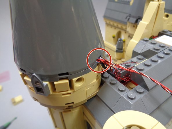 All loose wires should be collected inside the cone, and only two wires should extend out: the red 12&quot; wire and the red/black/white 36&quot; wire.