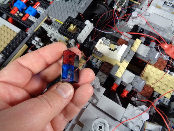 As shown in the first photo for this step, you should now be able to lift out the entire computer assembly.