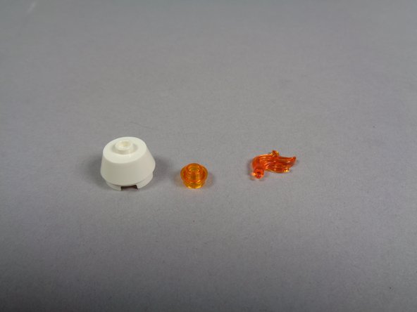 As shown in the first photo, remove the two transparent top pieces from each candle cone as shown.