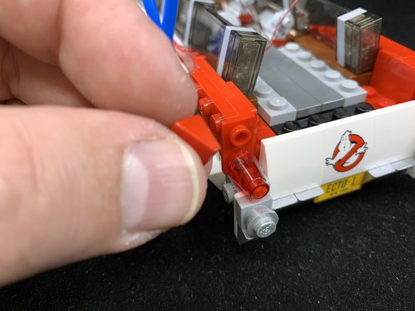 As shown in the second photo, make sure the tail light power wire runs under the side window and into the main interior of the car.