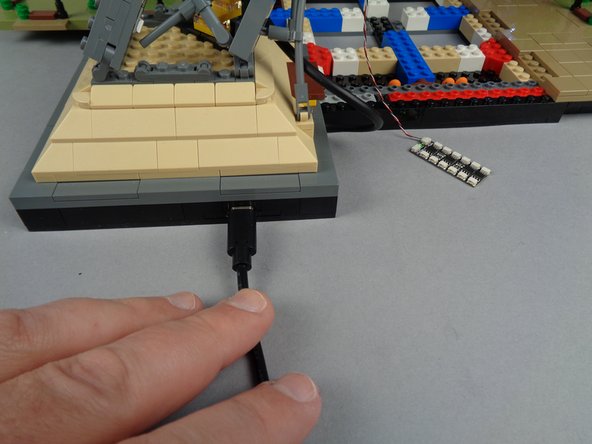 As shown in the first photo for this step, connect your USB-C power cable and make sure the power switch is on.