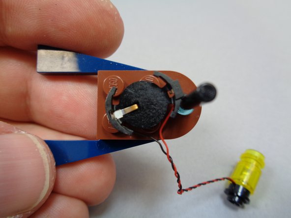 If necessary, re-position the battery pack to allow the boat frame to re-attach firmly.