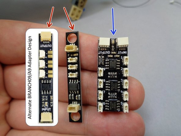 Inside Bag 10, there are two different types of adapters: two BRANCH09 adapters and one BRANCH09X adapter.  The first photo shows two versions of the BRANCH09 adapter board on the left (red arrows), and the BRANCH09X on the right (blue arrow).  The BRANCH09 adapters have three connectors.  You will use the BRANCH09X adapter first.